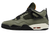 Undefeated x Air Jordan 4 Retro 2025 pointed left of a white background